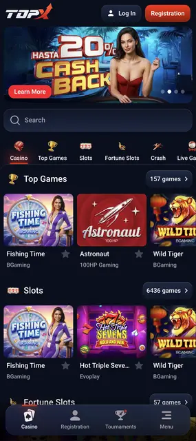 TopX — inicio del casino con la oferta de cashback y los títulos destacados